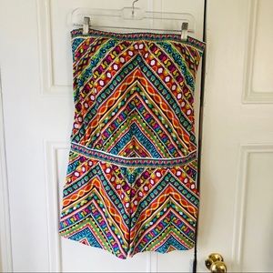 Trina Turk strapless swim romper.